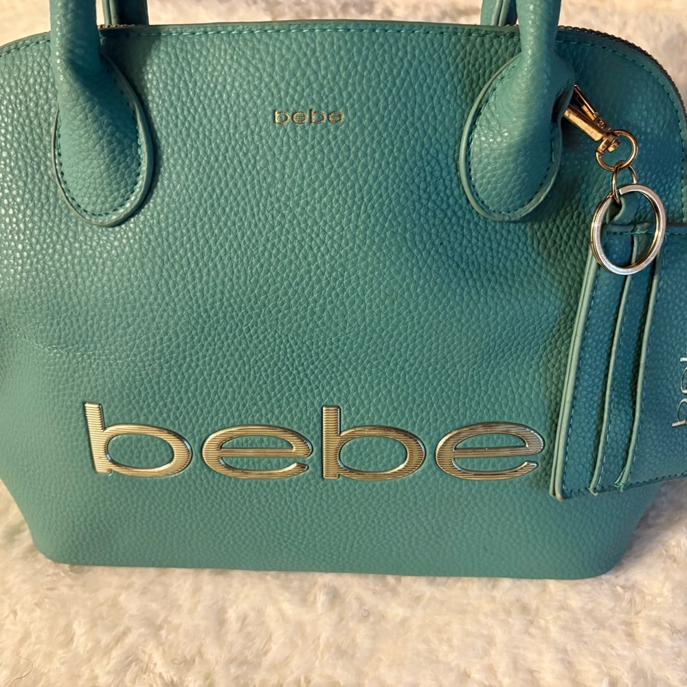 Bebe Blue Satchel Bag with Glossy Finish and Gold Accents